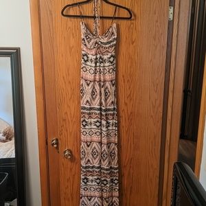 Floor length, halter sun dress.